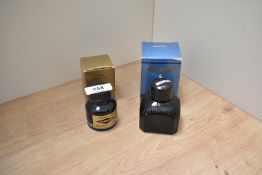 A bottle of Onoto quartz black ink and a bottle of Diamine ink