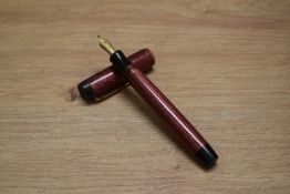 A Parker Duofold Senior Streamlined button fill fountain pen in black and red herringbone with one