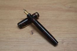 A Parker Duofold Senior Streamlined button fill fountain pen in rose and black with two cap bands