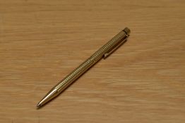 A Sheaffer Targa 1007 Classic ballpoint pen in gold plated geometric pattern