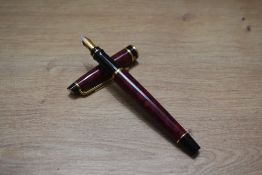 A Waterman Expert converter fill fountain pen in flame red having Waterman France M nib