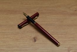 A Sheaffer TRZ Targa slim in burgundy with gold trim having Sheaffer nib