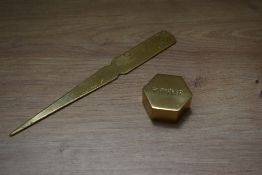 A Parker brass paperweight and Parker Duofold letter opener