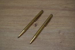 A Sheaffer TRZ ballpoint pen and propelling pencil set in gold plate.
