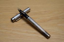 A Sheaffer Targa 1010X GT Classic converter cartridge fill fountain pen in silver plated diamond