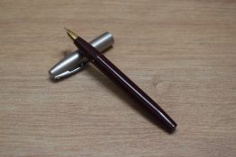 A Sheaffer Imperial Deluxe II touchdown fill fountain pen in burgundy with brushed steel cap