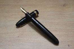 A Mabie Todd & Co Swan 4660 twist fill fountain pen in black with one broad and two narrow bands