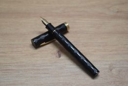 A Sheaffer No Nonsense cartridge fill fountain pen in black with diamond and line pattern having
