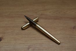 A Parker 50 Signet converer fill fountain pen gold plated fluted design having medium nib