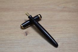 A Parker Duofold button fill fountain pen in chocolate brown with decorative band to the cap