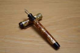 A Parker Duofold Special button fill fountain pen in pearl and gold with single band to the cap