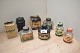 A Collection of vintage Swan ink bottles and containers