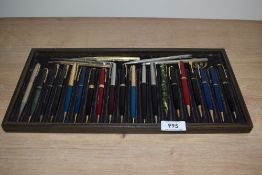 A collection of twenty five propelling pencils mainly Parker