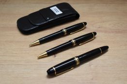 A Montblanc Meisterstuck 149 piston fill fountain pen, ballpoint pen and propelling pencil in