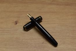 A Parker Deluxe Challenger button fill fountain pen in black with three narrow bands to the cap