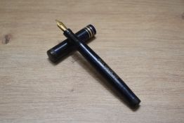 A Mabie Todd & Co Swan SM112B/60 Self filler lever fill fountain pen in black with two narrow