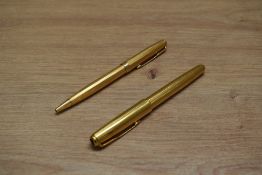 A Parker Sonnet converter cartridge fill fountain pen and ballpoint pen in gold plated cascade