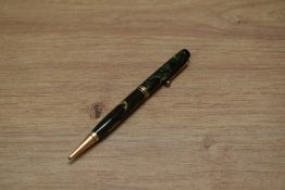 A Parker Duofold Deluxe Propelling pencil in green and black marble with one broad and two narrow