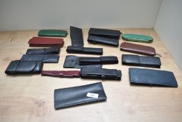 Approx Eighteen soft pen cases mainly leather