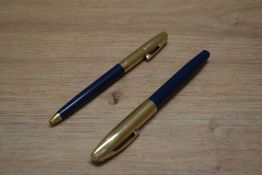 A Sheaffer Imperial VIII touchdown fill fountain pen and ballpoint pen in blue with gold cap