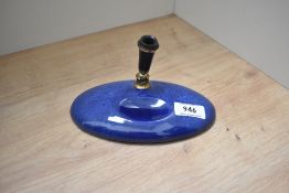 An ink pen desk stand in lapis blue ceramic. No pen