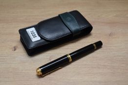 A Pelikan M800 roller ball pen in black. In soft case