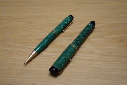 A Parker Duofold Special button fill fountain pen and propelling pencil in jade green with two bands