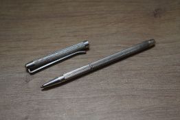 An unnamed hallmarked silver ballpoint pen