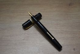 A Mabie Todd & Co Blackbird Self filler lever fill fountain pen and Fyne Poynt propelling pencil set