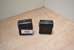 A small click top ink well and vesta case marked ink and light