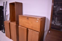 A selection of vintage teak ladderax cabinets and supports