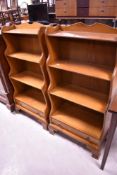 A pair of vintage bookshelves in the reproduction Regency style , width approx. 57cm