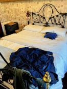 A Victorian cast and brass double bed frame and base