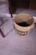 An earthenware bread crock