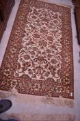 A tradtional fireside rug, approx. 160 x 90cm