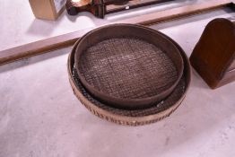 Two vintage garden riddles