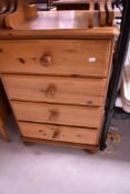 A 20th Century yellow pine bedroom chest of four drawers, height approx. 84cm
