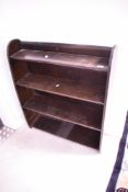 A vintage dark stained floor standing bookshelf, width approx. 66cm