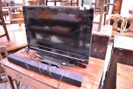 A Sharp TV and Samsung sound bar