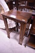 An early 20th Century mahogany three part nest of tables