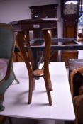 An early 20th Century oak plant stand