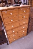 A vintage pine chest of drawers, dimensions approx. W80 D40 H123cm