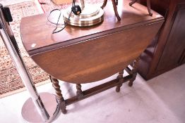 An early 20th Century oak gateleg table