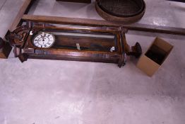A 19th Century walnut cased Vienna style wall clock