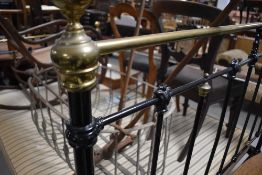 A Victorian cast and brass double bed frame and base