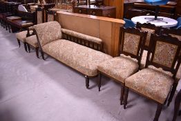 A Victorian mahogany framed salon suite, comprising chaise longue , gents and ladies easy chairs and