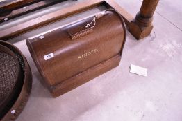 A vintage cased Singer sewing machine