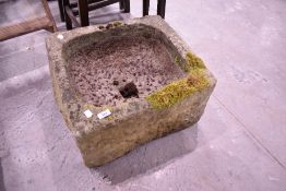 A large stone trough, approx. 50 x 45cm, height29cm