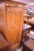 A yellow pine single wardrobe