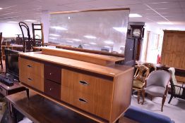 A vintage teak effect dressing table, approx width 145cm